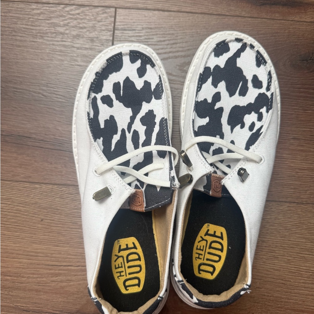 Hey Dude Women’s in Black and White Cow Print